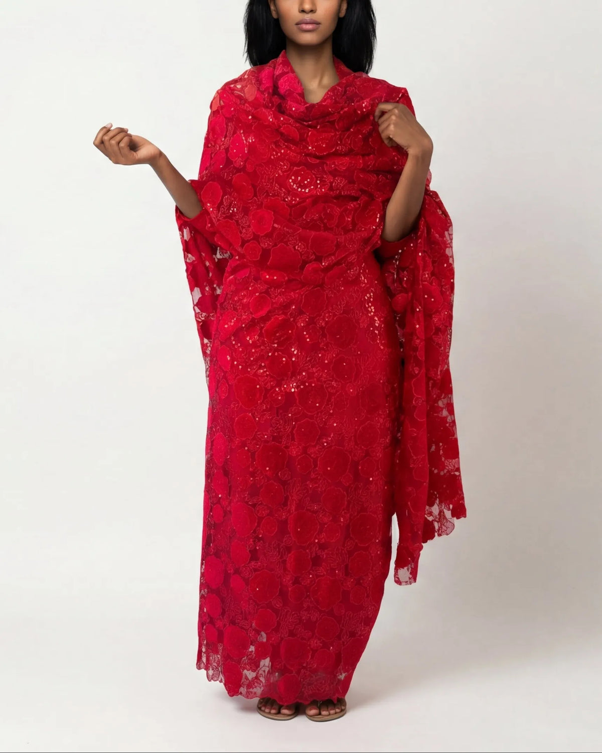 Jumanah deep red Sudanese jirtig toub with raised floral embroidery, front view draped
