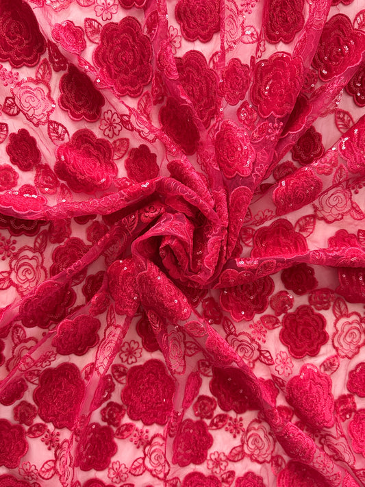 Close-up of raised crimson floral and sequin embroidery on Jumanah jirtig toub by Asalah