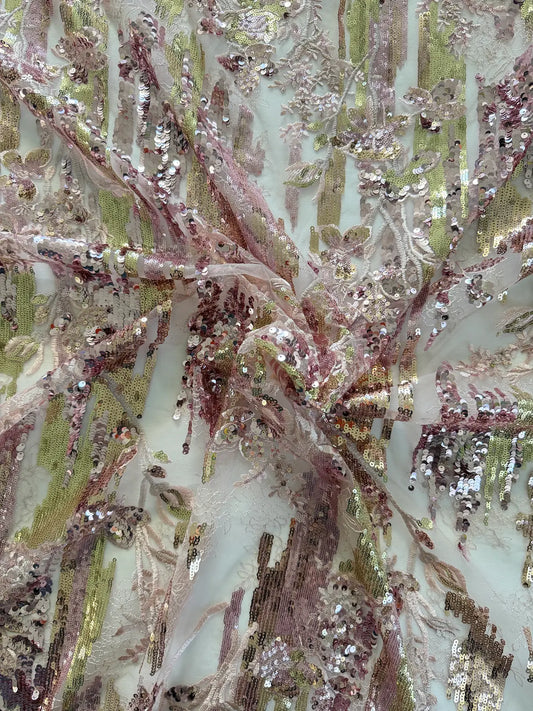 Close up of pink and gold sequin embroidery detail on Wardah Sudanese toub