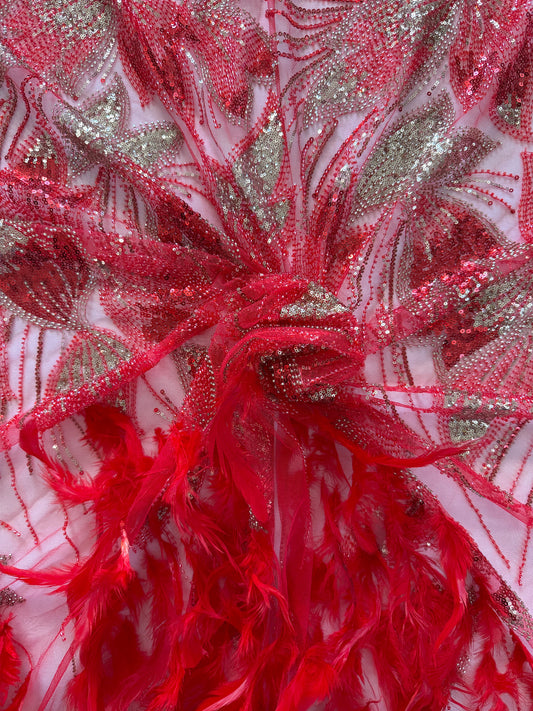Close up of red and gold sequin embroidery on Jamar Sudanese toub