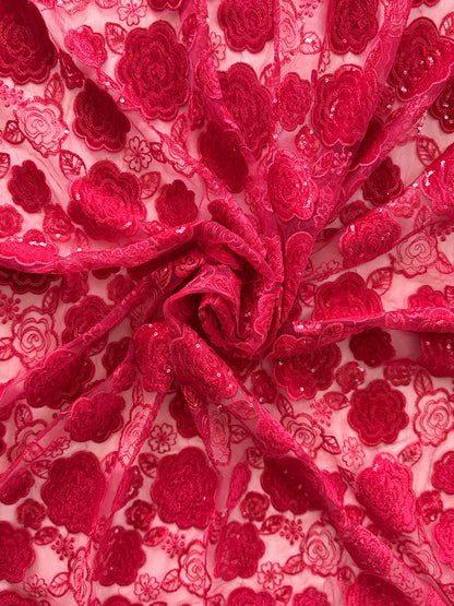 Close-up of raised crimson floral and sequin embroidery on Jumanah jirtig toub by Asalah