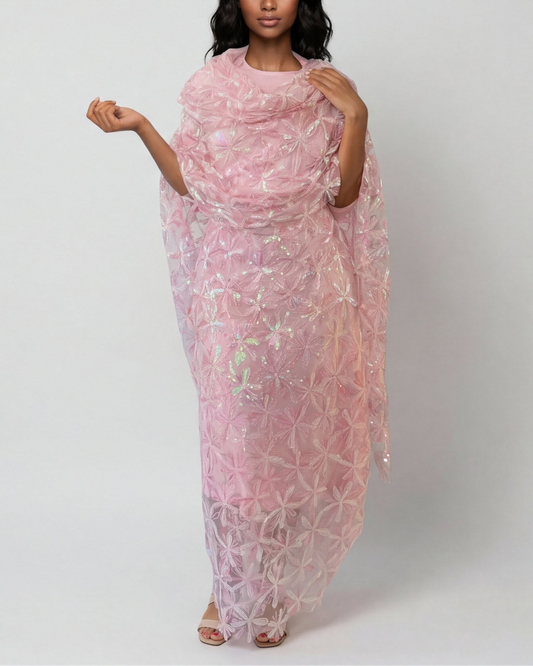 Luma pink Sudanese toub with daisy sequin embroidery in pink and white, front view worn draped