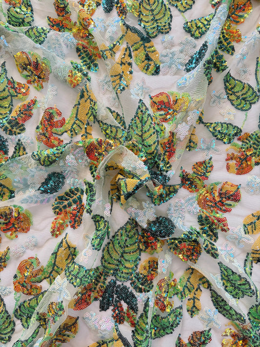 Close up of multicolor botanical sequin embroidery on Nadrah Sudanese toub