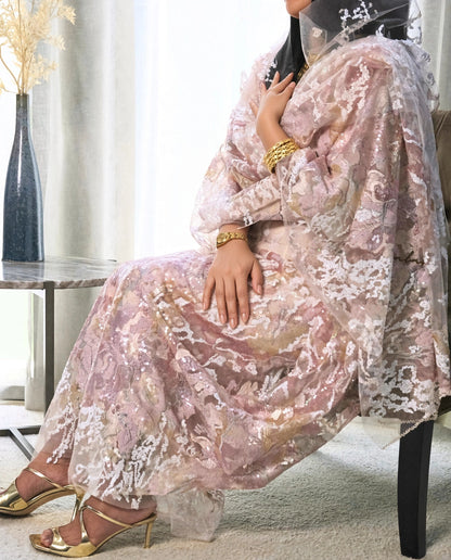 Nahla Toub - Pink Sudanese toub with sequin lace embroidery, seated view