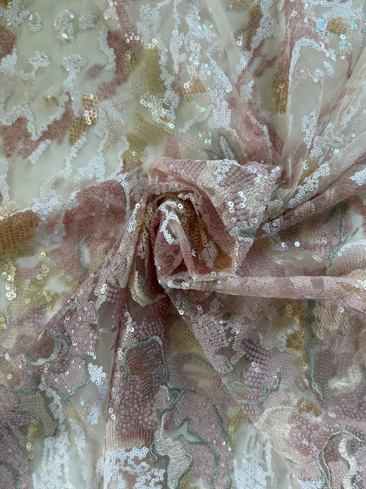 Close up of blush and gold floral sequin embroidery on Nahla Sudanese toub