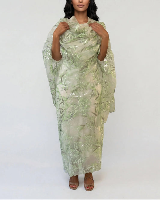 Rimah green Sudanese toub with leaf embroidery, front view worn draped