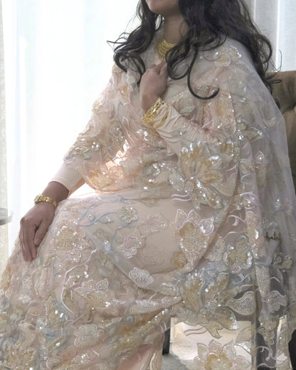 Ruwa Toub - Pink Sudanese toub with floral sequin embroidery, seated view