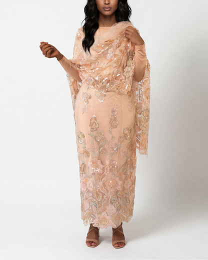 Ruwa blush Sudanese toub with peach and gold floral sequin embroidery, front view worn draped