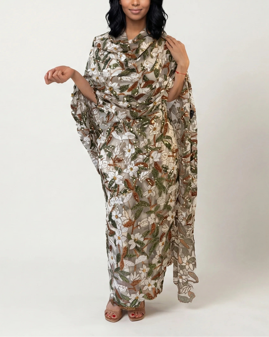 Ward olive gold Sudanese toub with white floral and green sequin embroidery, front view worn draped