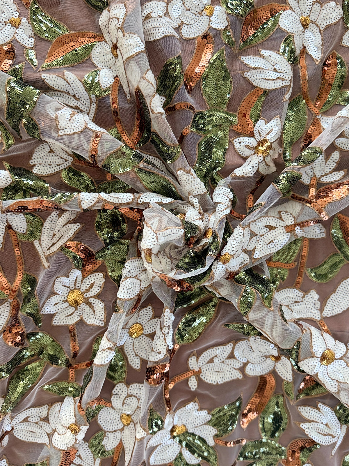 Close up of floral sequin embroidery on Ward Sudanese toub