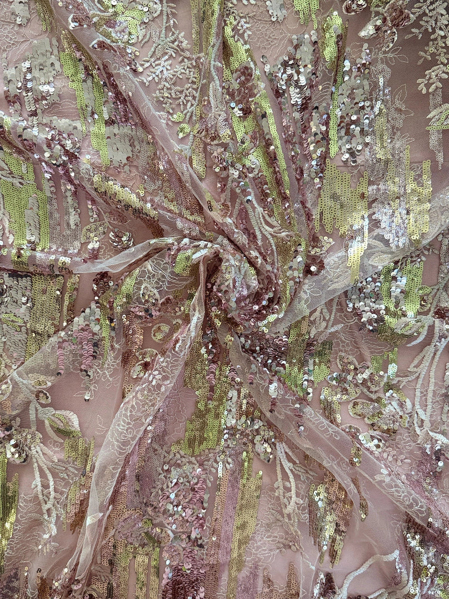 Close up of pink and gold floral sequin embroidery on Wardah Sudanese toub