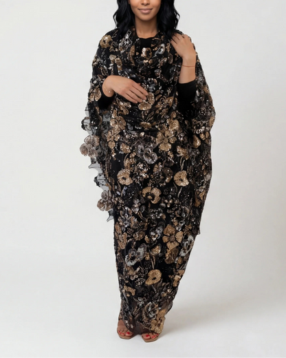 Samar black Sudanese toub with gold floral sequin embroidery, front view worn draped
